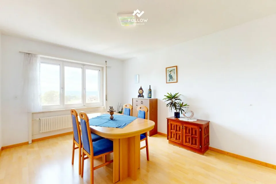 Multi-family house with development potential and additional building plot in Heitenried