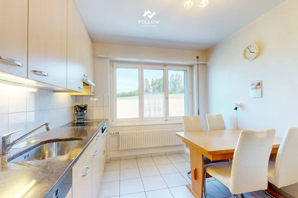 Multi-family house with development potential and additional building plot in Heitenried