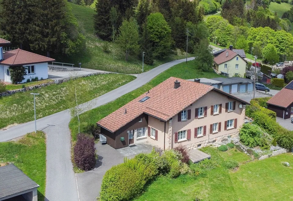 Maison mitoyenne de 4.5 pièces avec terrasse et jardin Quartier résidentiel et calme