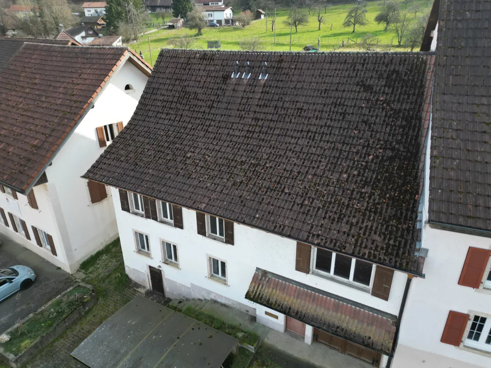 Immeuble avec 2 logements, grand jardin et combles aménagés à Vendlincourt – photo 3 sur 13