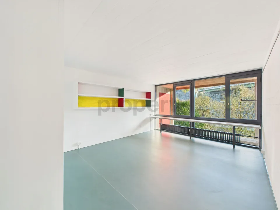 Wohnen in einer Ikone der Schweizer Architektur | Einzigartige Maisonettewohnung im denkmalgeschützten Atelier-5-Ensemble in Flamatt