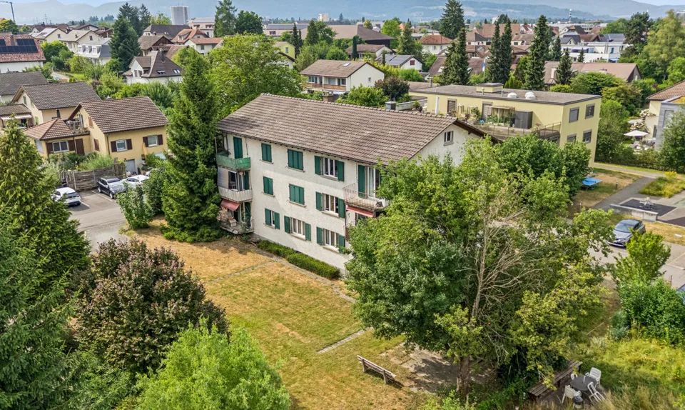 Maison multifamiliale entièrement louée avec un potentiel de développement attrayant
