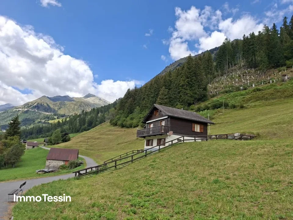 ZWEITWOHNSITZ: Wunderbares Chalet mit edlem Holzwerk und Einliegerwohnung an gut besonnter Alleinlage