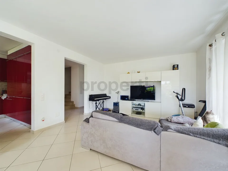 Modernes 7.5-Zimmer-Einfamilienhaus in Caslano mit Blick ins Grüne