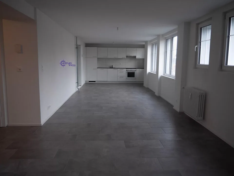 Gebäude mit 7 Wohnungen und einem Geschäftslokal – Foto 10 von 13