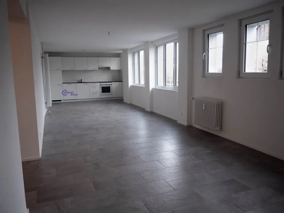 Gebäude mit 7 Wohnungen und einem Geschäftslokal – Foto 11 von 13