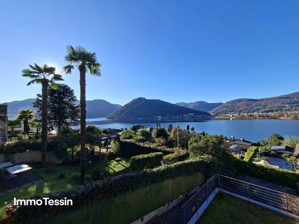 GELEGENHEIT: Wohlfühloase mit fantastischer Seesicht auf den Lago di Lugano an sehr ruhiger und sonniger Lage nahe Lugano