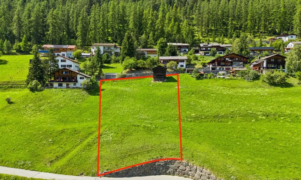 Terrain spacieux avec part de terrain constructible à Davos Wiesen