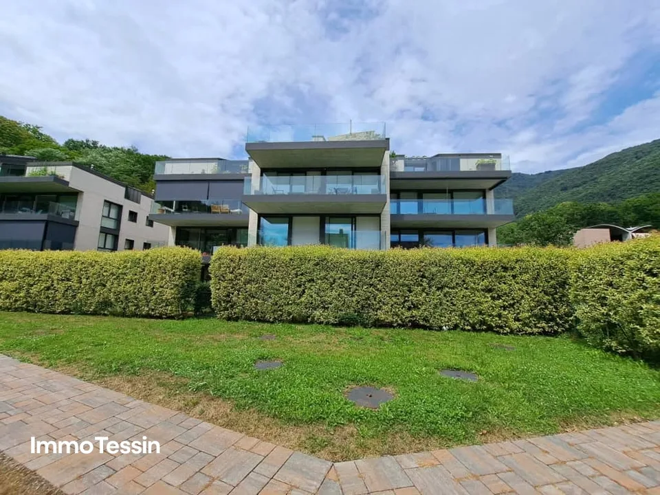 Exklusive & neuwertige Wohnung nahe Lugano und dem Lago die Lugano mit freier Sicht in die Tessiner Bergwelt