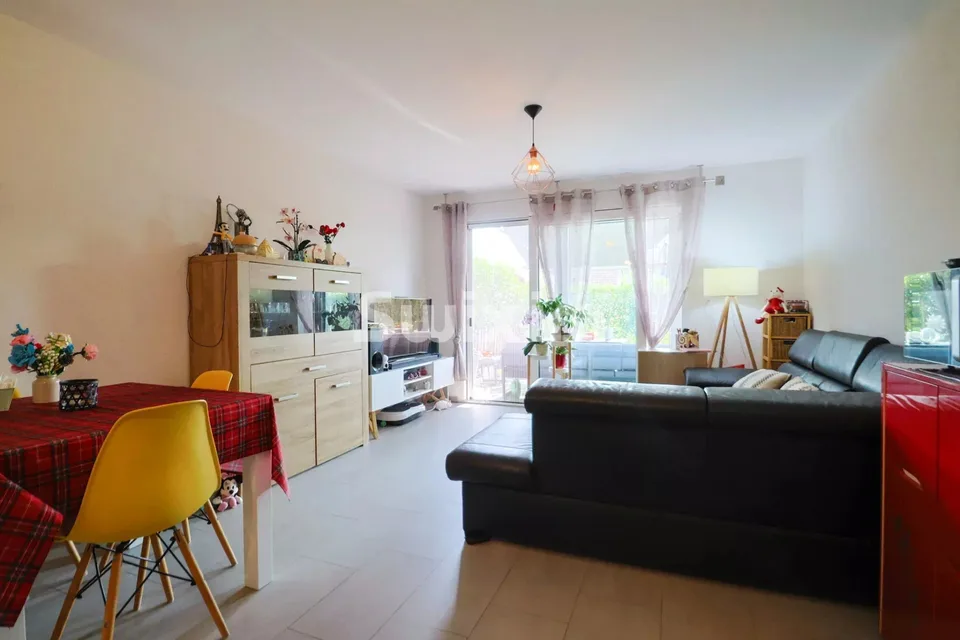 Bel appartamento di 3,5 locali al piano terra con terrazza privata