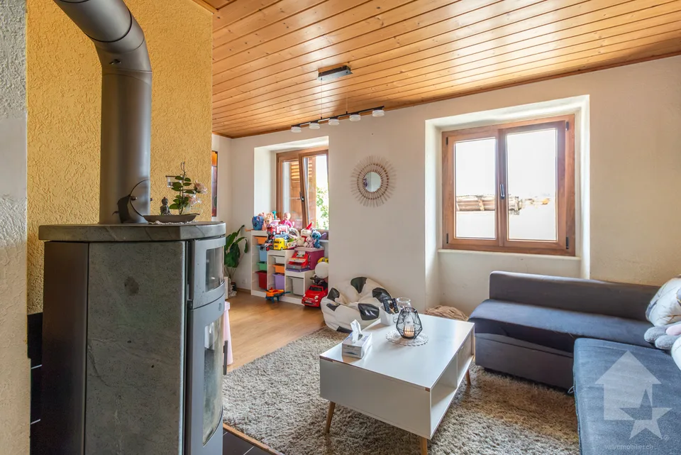 Maison villageoise avec duplex 3.5 pièces de 90 m2 et local commercial