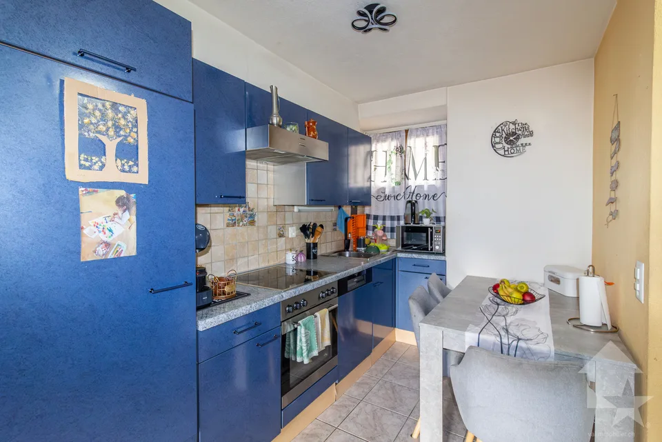 Maison villageoise avec duplex 3.5 pièces de 90 m2 et local commercial