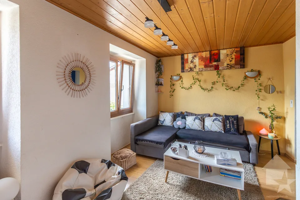 Maison villageoise avec duplex 3.5 pièces de 90 m2 et local commercial