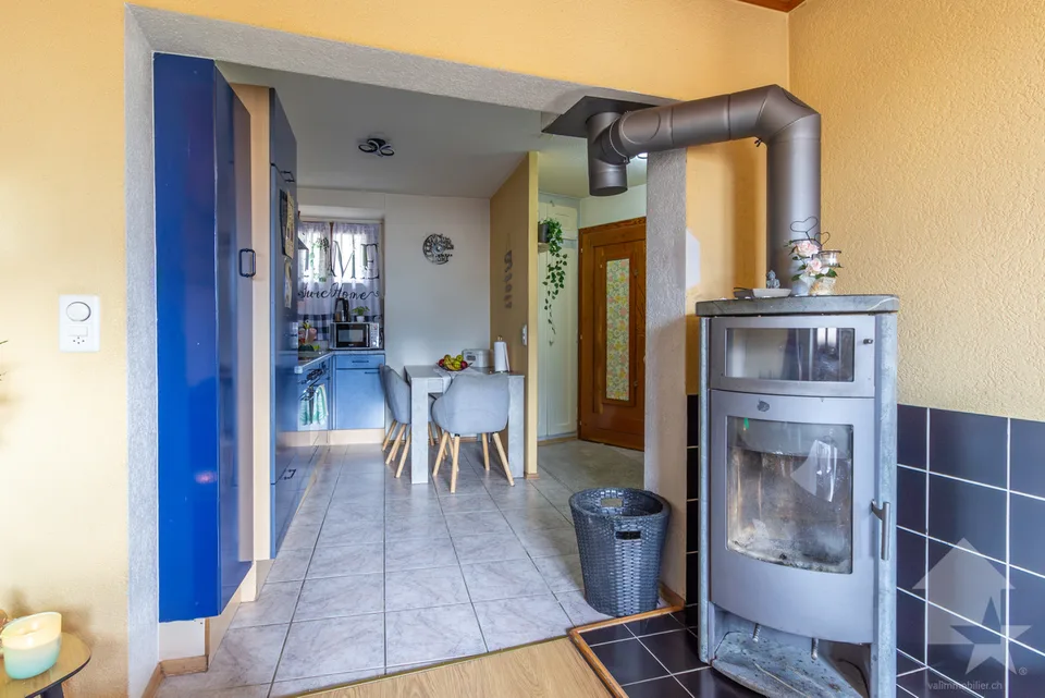 Maison villageoise avec duplex 3.5 pièces de 90 m2 et local commercial