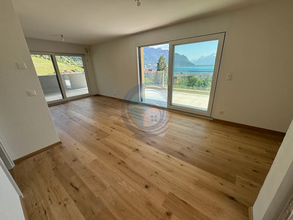 APPARTAMENTO ATTICO DI 2,5 LOCALI CON VISTA PANORAMICA SUL LAGO – foto 3 di 12