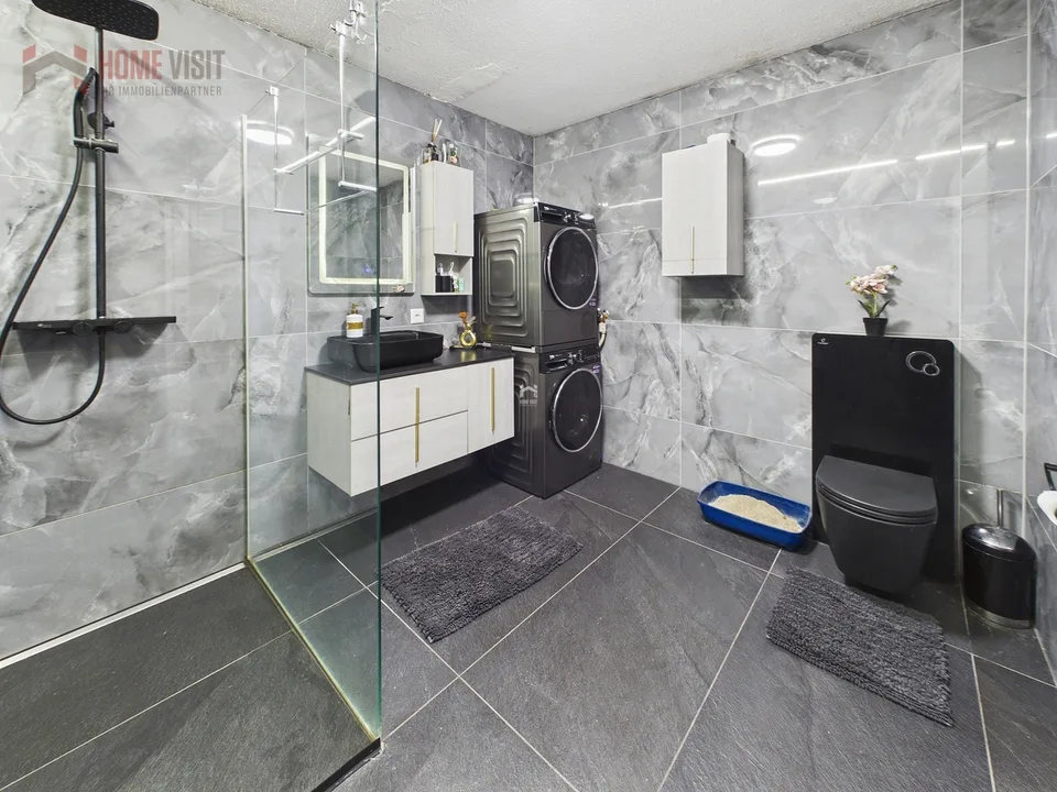 Appartement de jardin élégant de 4,5 pièces avec jardin et terrasse