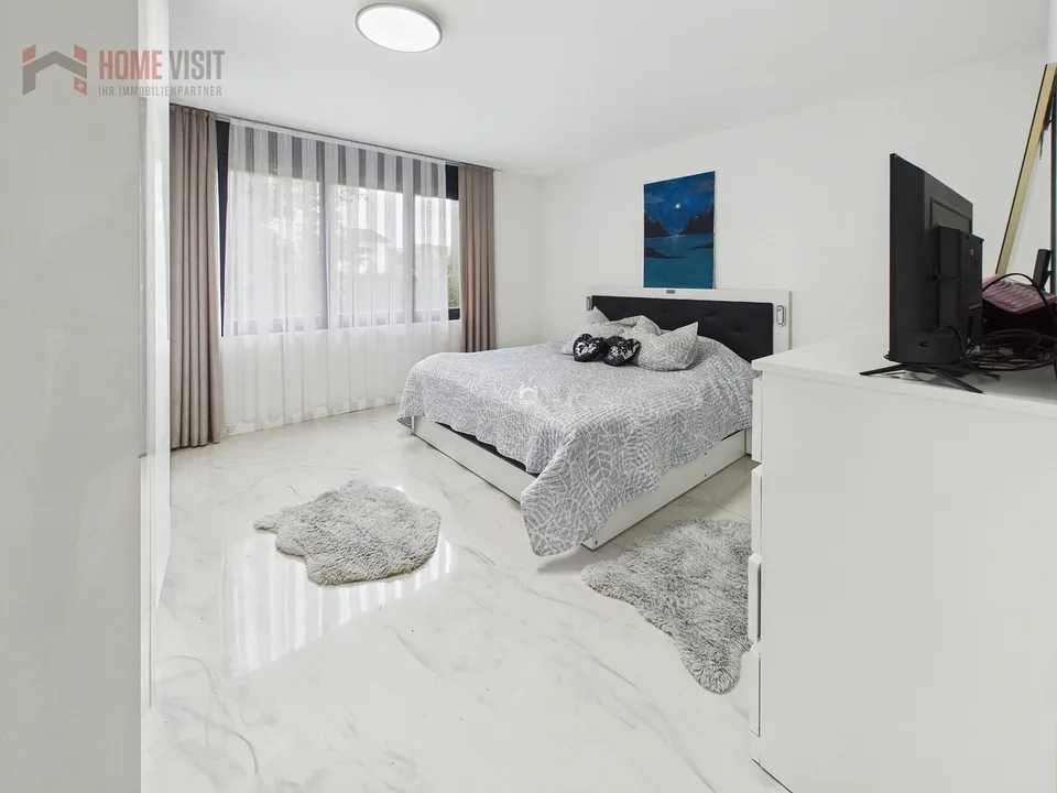 Appartement de jardin élégant de 4,5 pièces avec jardin et terrasse