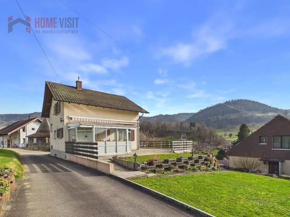 Maison individuelle avec véranda et belle vue sur la vallée dans la nature