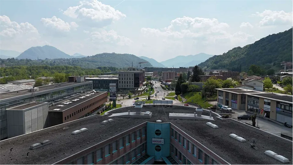 Shop with large windows on the ground floor; "Manno's Egg"
