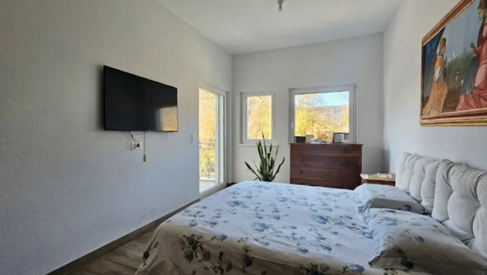 Villa  contigüe située dans un agréable quartier prisé de Fleurier