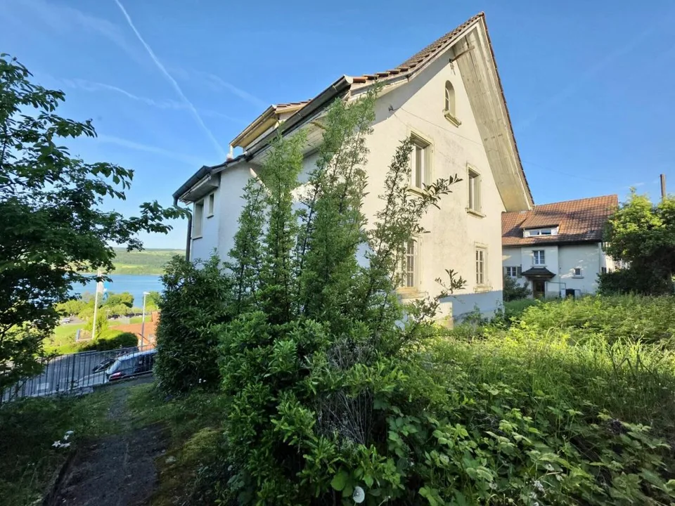 Einfamilienhaus mit Baulandreserve inkl. Neubauprojrekt-DEFH mit Traum-Seesicht