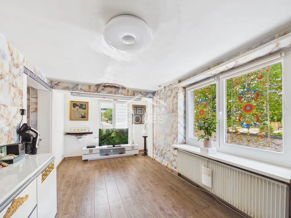Maison avec revenus supplémentaires