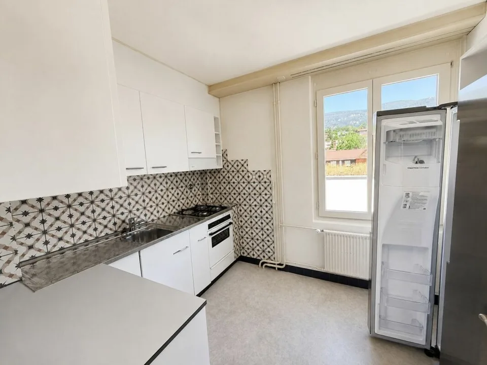 Multi-family house with 4 residential units in a central location in Bellach
