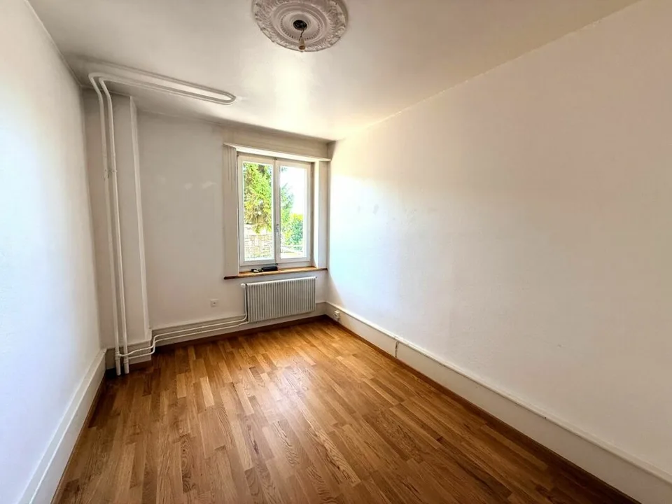 Multi-family house with 4 residential units in a central location in Bellach