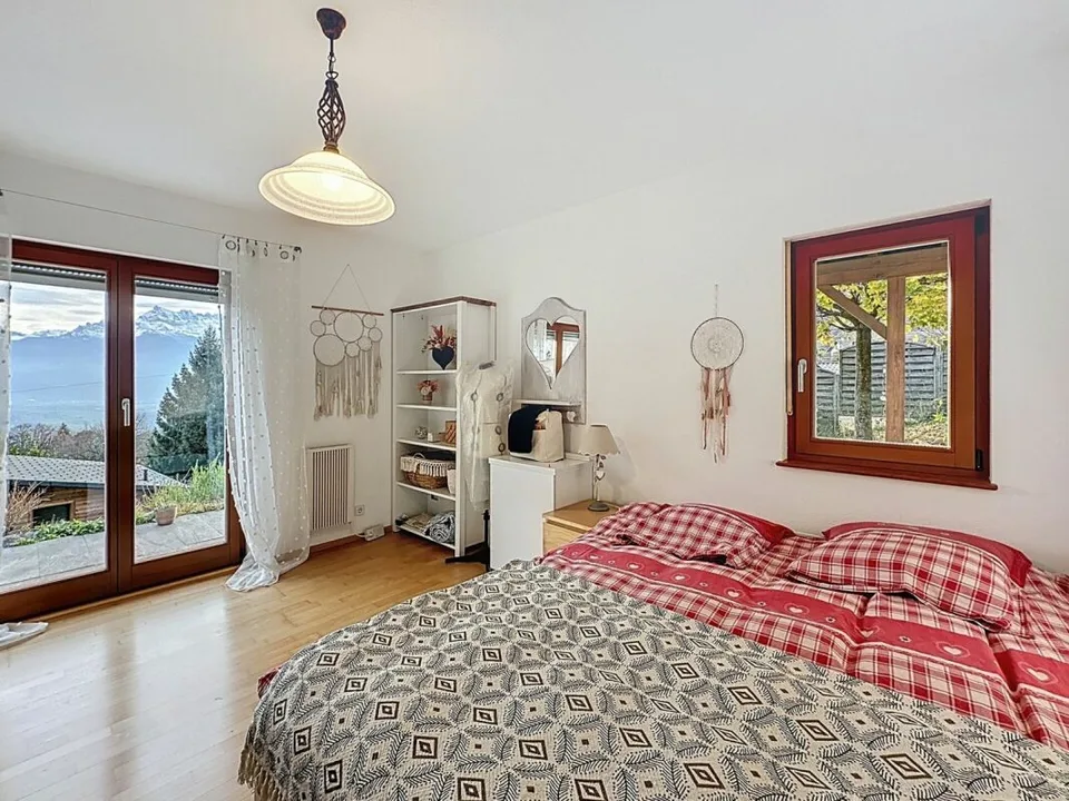 Magnificent architect-designed villa with spectacular panoramic view of the plain and the Dents-du-Midi