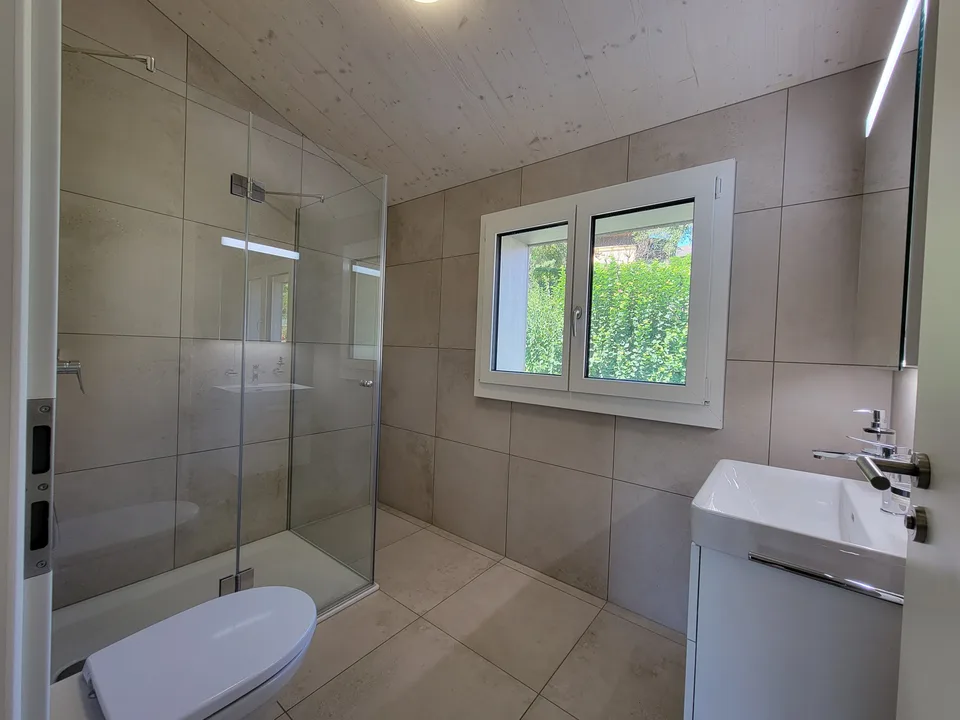 High ceilings in the living room, modern attic renovated in 2024 and stylish expansion