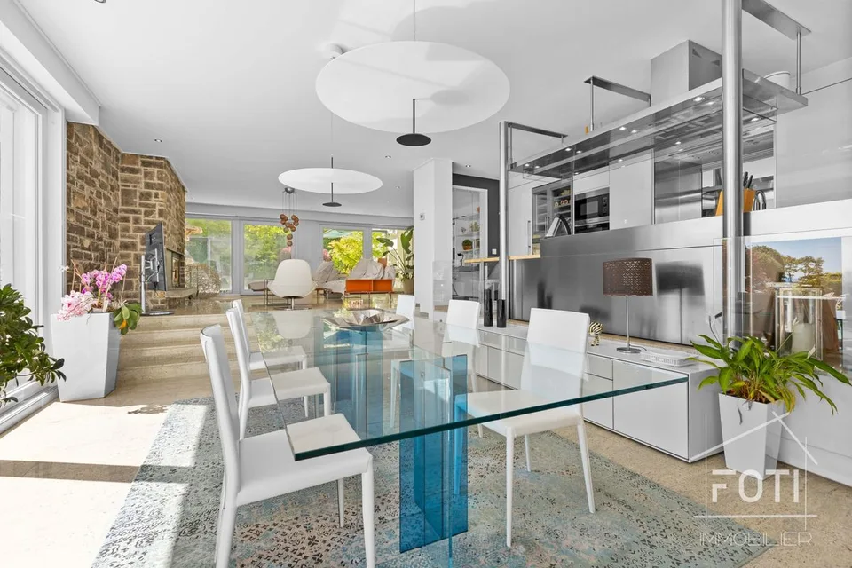 Superb high-end duplex with 5.5 rooms, garden, and private pool.