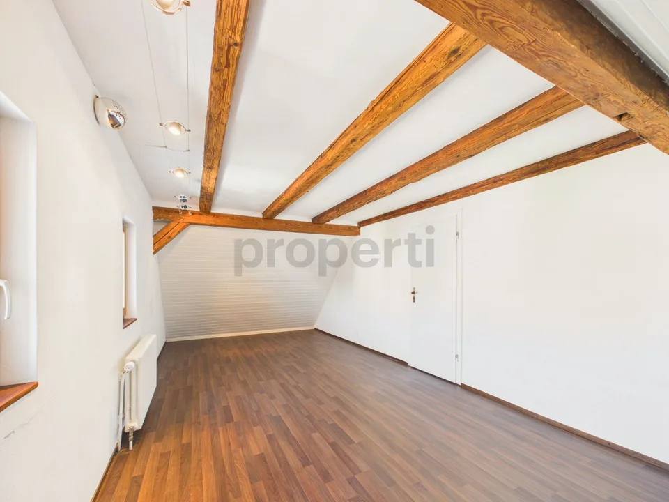 Three living levels, historic wooden beams, and a private entrance near Lake Untersee