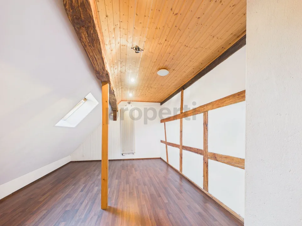 Three living levels, historic wooden beams, and a private entrance near Lake Untersee
