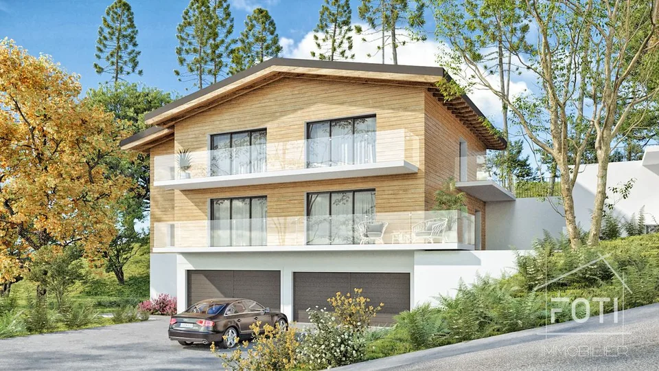 Appartement de 4,5 pièces aux combles avec sous-sol et garage double.