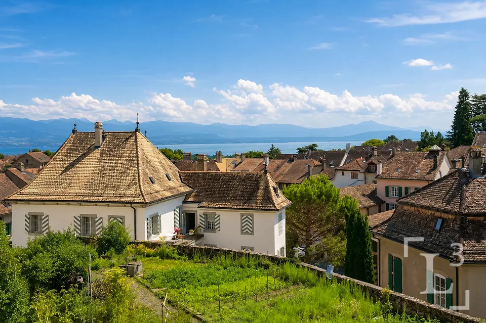 Maison au coeur de la vieille-ville avec l'option d'un jardin potager