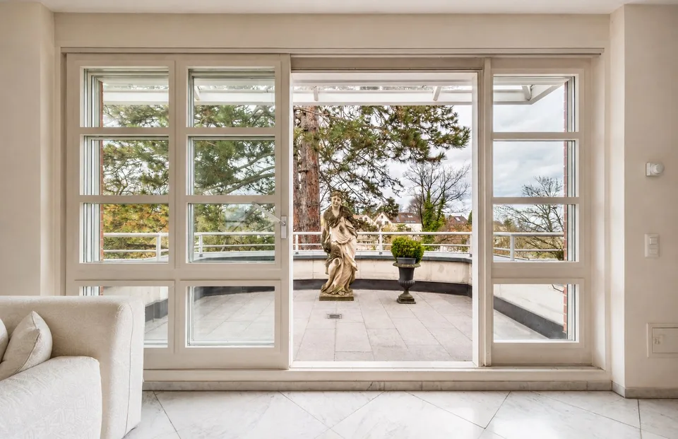 Exclusive penthouse apartment with wrap-around terraces and panoramic views over Basel