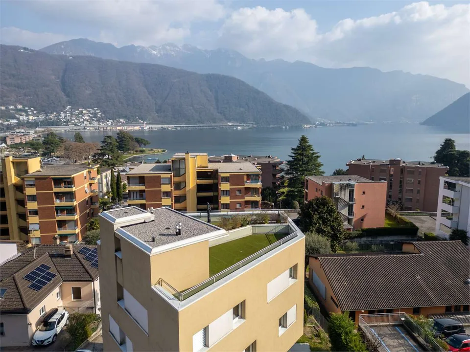 Melide - moderno 4.5 loc. con vista lago e roof-top