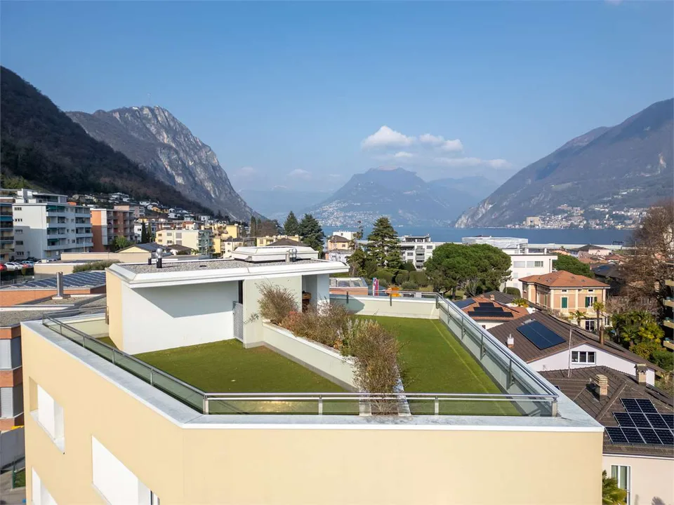 Melide - appartement moderne de 4,5 pièces avec vue sur le lac et jardin sur le toit