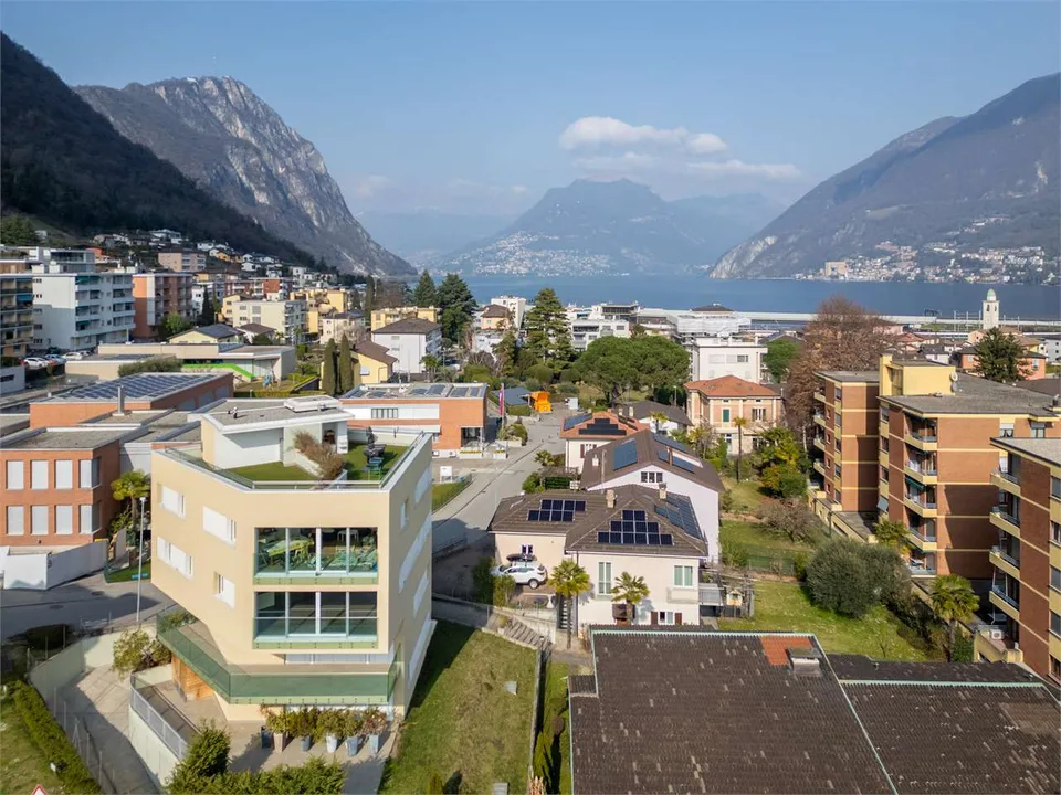 Melide - appartement moderne de 4,5 pièces avec vue sur le lac et jardin sur le toit