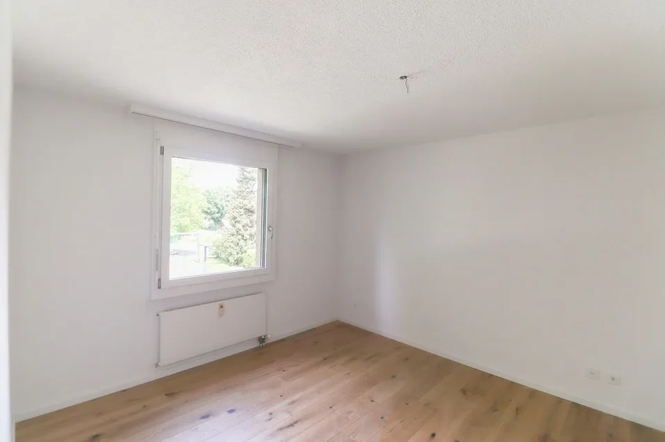 Freshly renovated 4.5-room apartment with parking space, workshop, and cellar compartment – photo 14 of 21