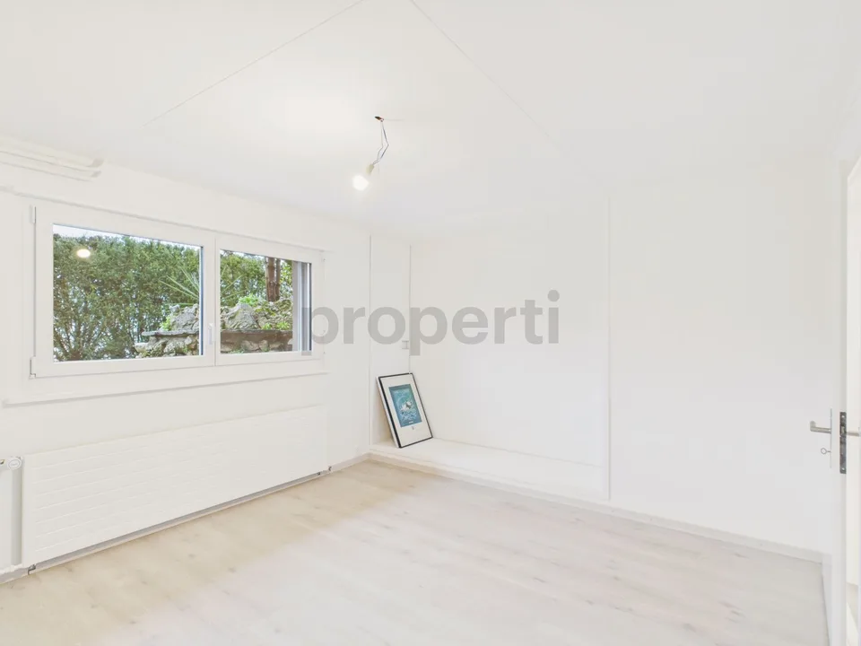 Modern 6.5 room row house with garden in La Neuveville