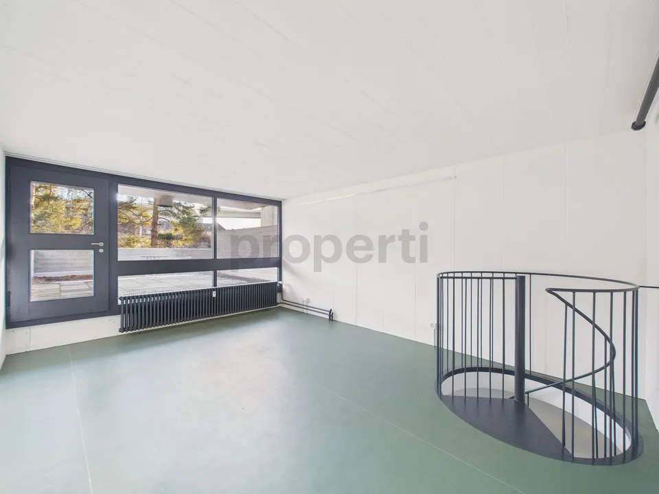 Vivre dans une icône de l'architecture suisse | Appartement-maisonnette unique de 4,5 pièces dans l'ensemble protégé Atelier-5 à Flamatt