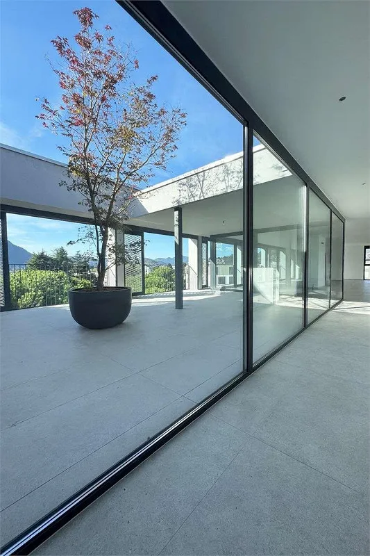 Neue geräumige und helle Penthouse-Wohnung in Massagno – Foto 2 von 11
