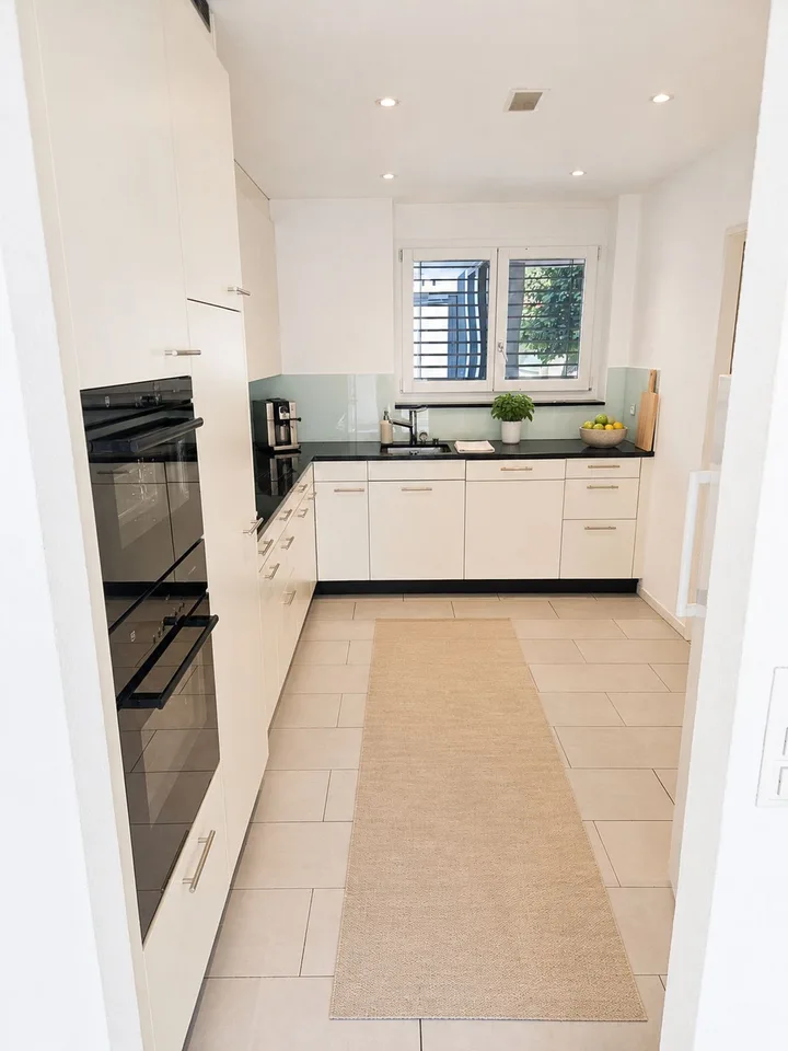 Exklusive 4.5-Zimmer-Gartenwohnung mit 400 m² Privatgarten in Aesch