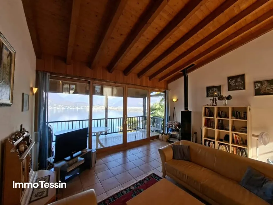 House with breathtaking 180-degree panoramic lake view of Lake Maggiore, terrace, garden, and direct access – photo 7 of 13