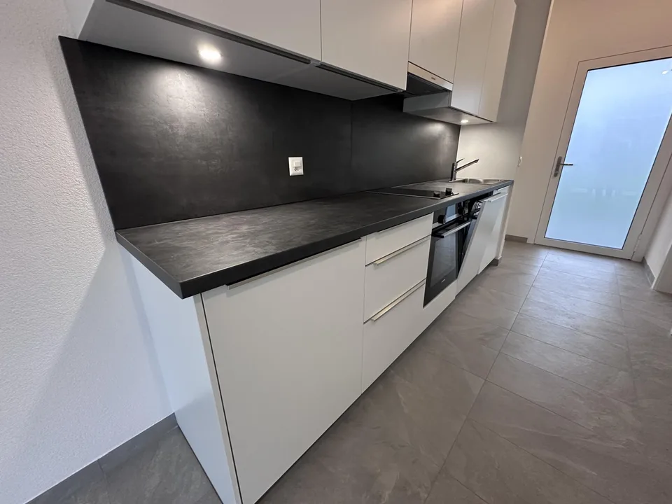 1,5 Locali nuovo con terrazza e giardino!