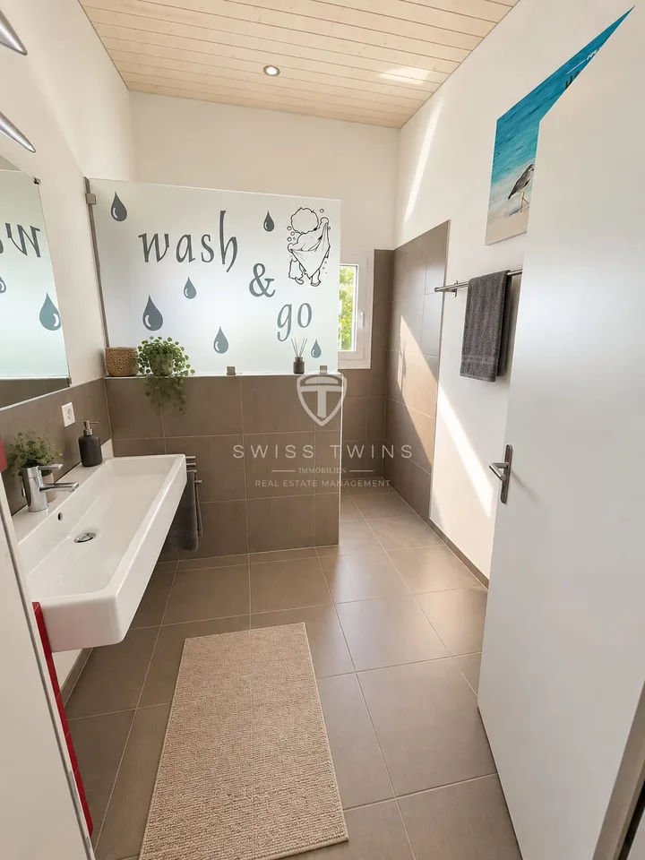 Modernes 6.5-Zimmer-Einfamilienhaus mit Wellnessoase in Emmenbrücke – Foto 9 von 13