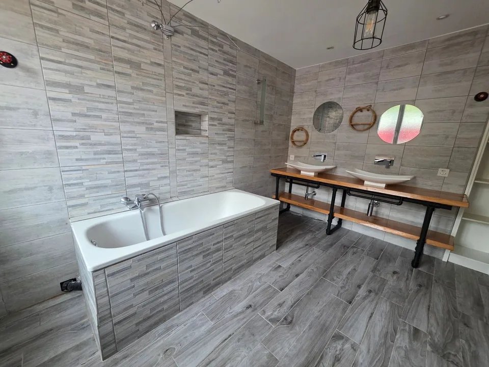Maison jumelée composée de 5 appartements entièrement rénovés – photo 12 sur 13