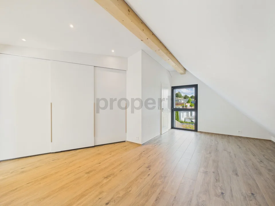 Attikawohnung direkt am Waldrand mit Zürichseeblick, Minergie-Standard und Free-Cooling – Foto 7 von 14