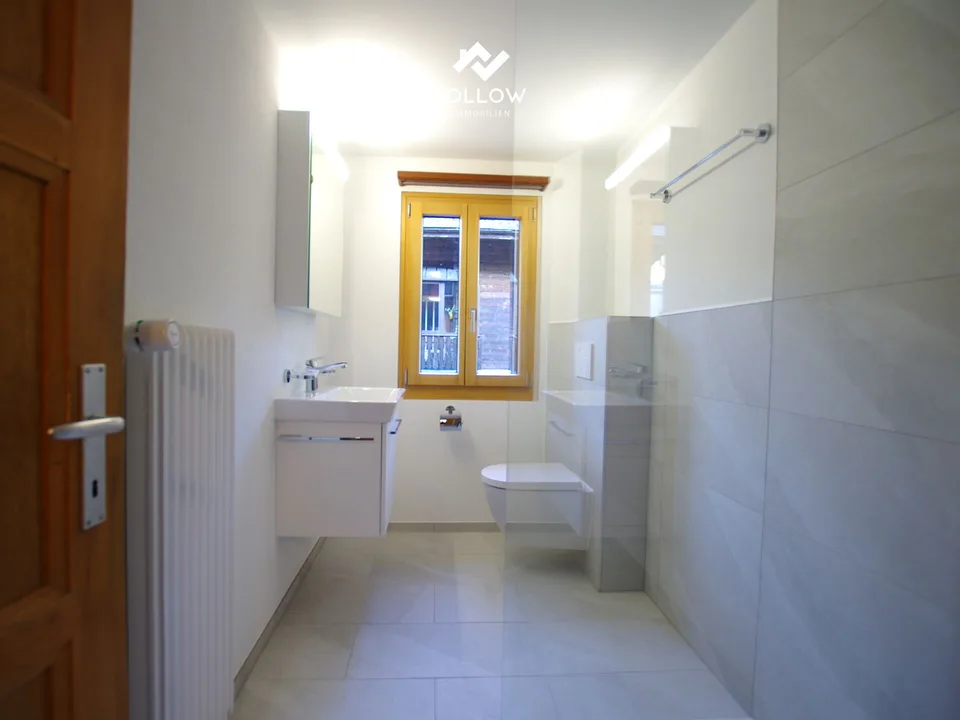 Grosse, teilrenovierte und familienfreundliche 4.5-Zimmer-Wohnung mit Balkon und Gartenanteil im Dorfzentrum von Fiesch – Foto 6 von 12